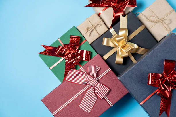 istock Valentine's Day background. Various gift boxes on pastel blue background. Valentines day concept. Flat lay, top view, copy space 1187809971