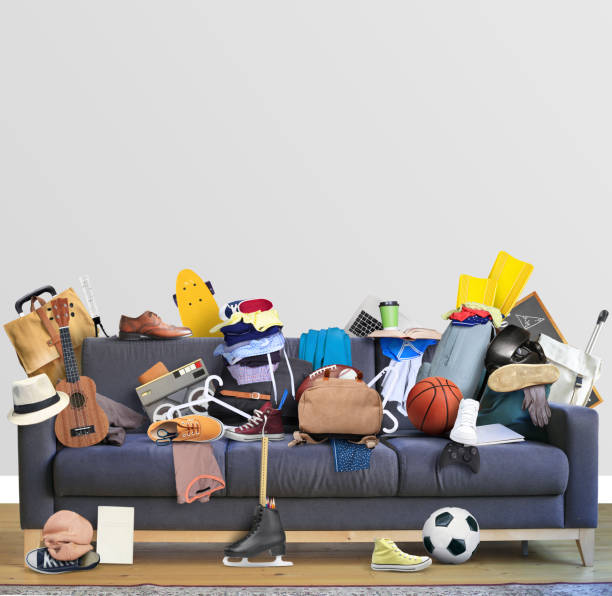 Large leather sofa with mess stock photo