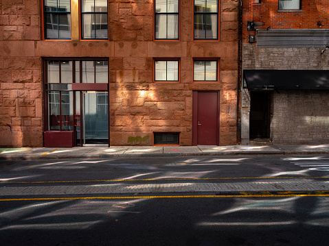 Newer and older brick buildings side by side in Boston