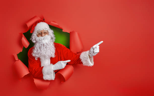 istock Santa Claus on color background. 1187818601