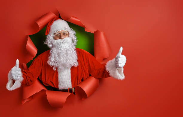 istock Santa Claus on color background. 1187818629