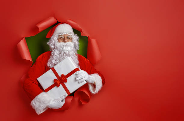istock Santa Claus on color background. 1187818630