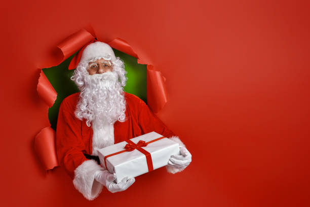 istock Santa Claus on color background. 1187818648