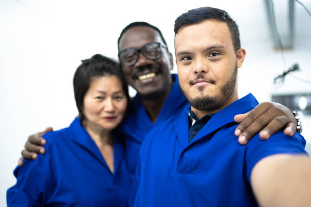 Colleagues taking a selfie in industry