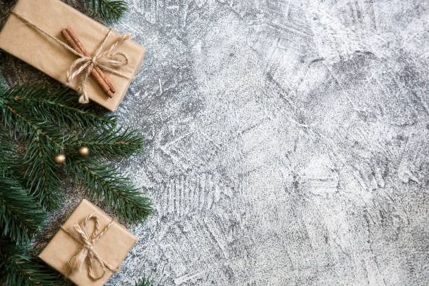 istock Christmas composition with gift boxes and fir branches. greeting card. 1187820550