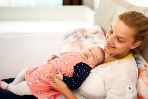 istock Mother with her newborn baby 1187820835