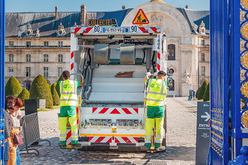 29 July 2019, Paris, France: Workers in the field of transportation and processing of solid waste on the streets