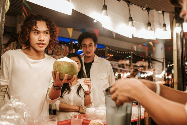 istock Can I have one coconut juice 1187821090
