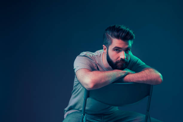 istock Neon portrait of a young attractive man 1187821198
