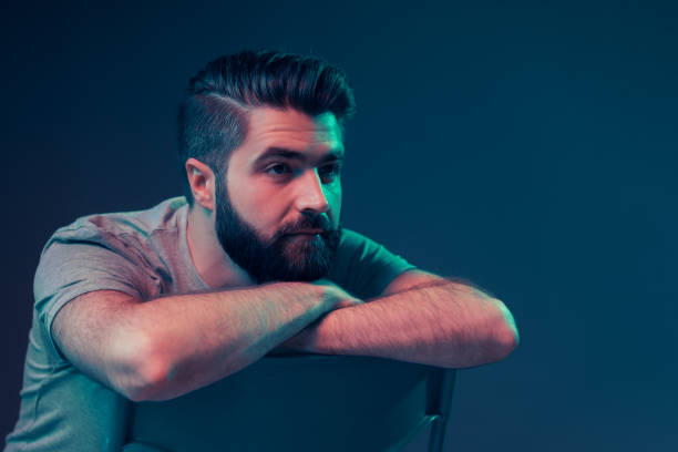 istock Neon portrait of a young attractive man 1187821203
