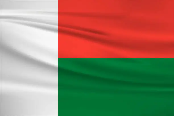 Vector illustration of Waving Madagascar flag, official colors and ratio correct. Madagascar national flag. Vector illustration.