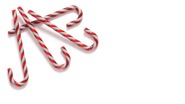 istock Christmas candy canes on white background 1187824014