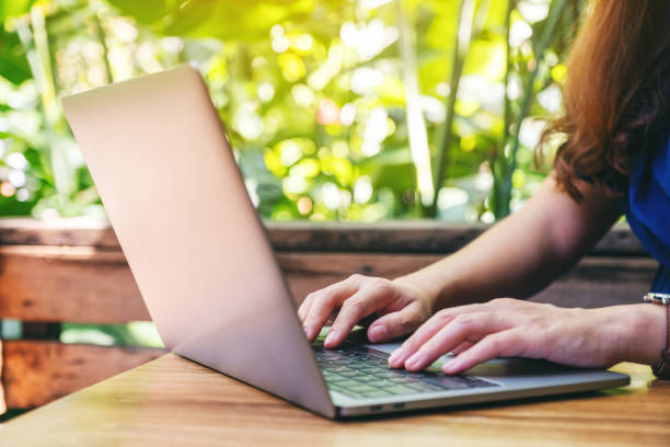 istock a woman working and typing on laptop computer on the table 1187825718