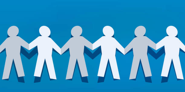 Symbol of union and cohesion with a human paper chain. Concept of solidarity and peace, with a human chain made of paper cut showing characters holding hands to show their unity. community outreach illustrations stock illustrations