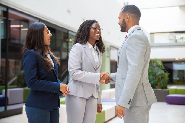 istock Happy diverse business partners greeting each other 1187828465