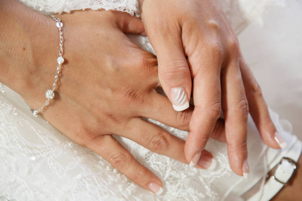 istock Cropped Hands Of Bride With Nail Art 1187832014