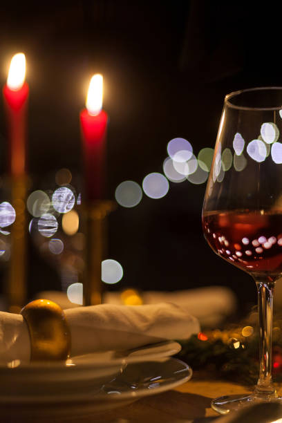 istock Christmas dinner with romantic candlelight and Christmas decorations 1187832260
