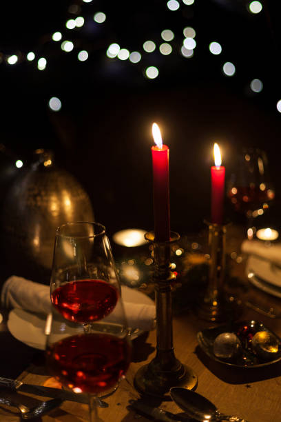 istock Christmas dinner with romantic candlelight and Christmas decorations 1187835495