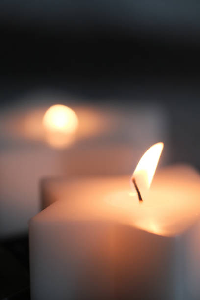 istock Burning candles close-up, selective focus. 1187841551