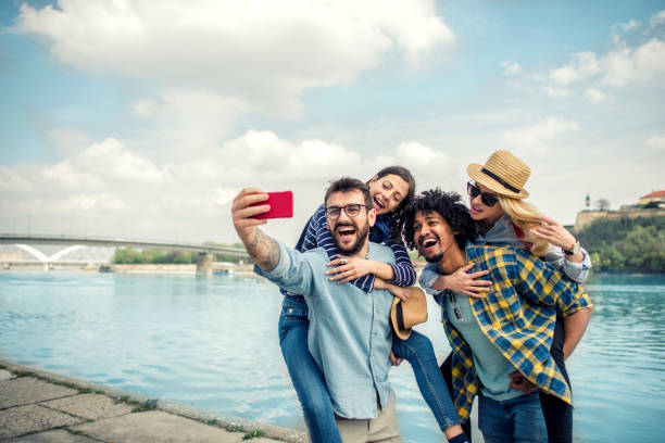 istock Group of friends making selfie 1187841810