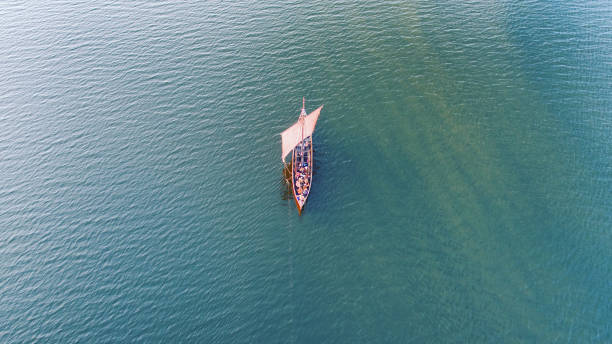 Viking ship at sea Viking ship at sea, Roskilde Fjord, Denmark. Image taken with a drone. viking ship photos stock pictures, royalty-free photos & images