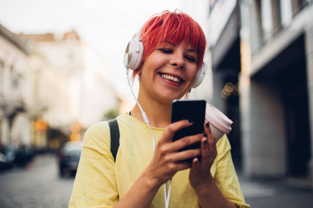 istock Modern girl typing a message 1187846805