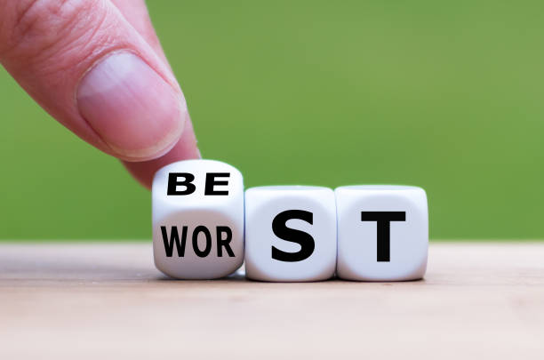 istock Hand turns a dice and changes the word 
