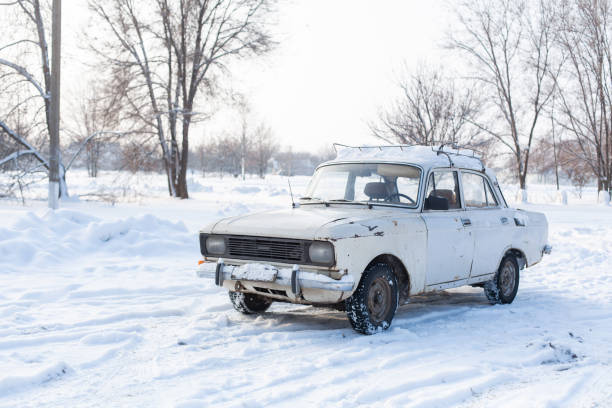 istock The car rides on a snowy highway. Difficult weather conditions. 1187854976