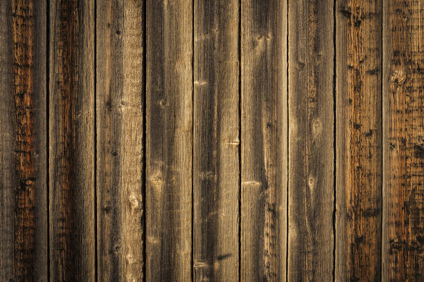 istock dark brown wood background 1187855110