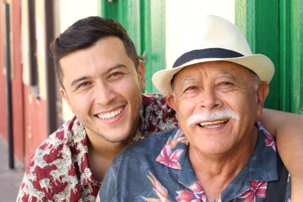istock Father and son laughing outdoors 1187855767