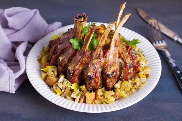 istock Crown roast of pork with apple and bread stuffing. 1187858192