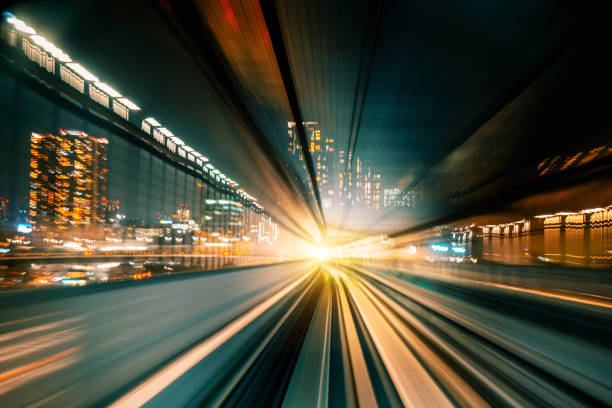 istock High Speed Motion Blur driving through a tunnel at night 1187859259