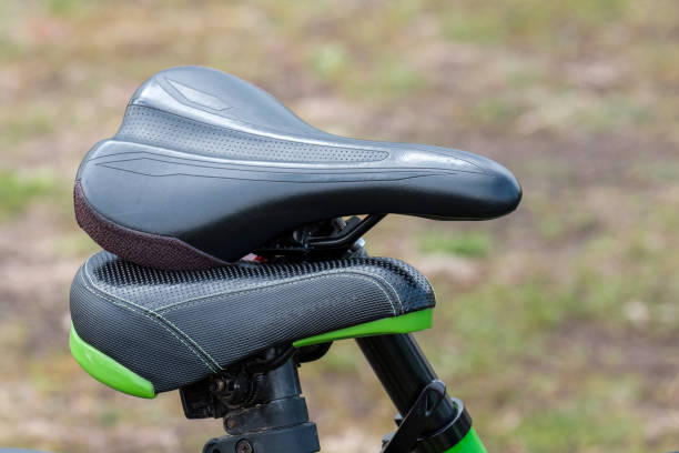 istock two Bicycle seats leaning against each other black 1187859520
