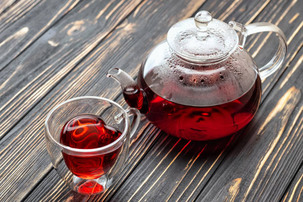 istock hibiscus tea in glass teapot and cup 1187866035