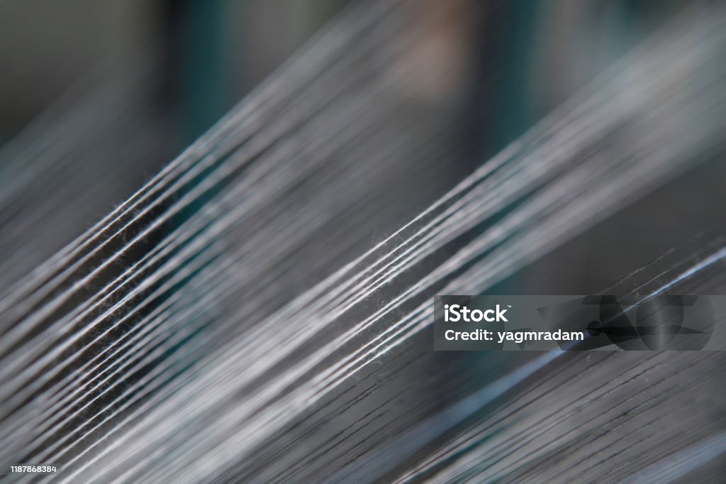 Close Up Macro Detail Of Yarn Thread Lines Running In The Weaving Loom  Machine Yarn Thread Lines Background Yarn Thread Lines Texture Textured  Fabric Background Stock Photo - Download Image Now - iStock