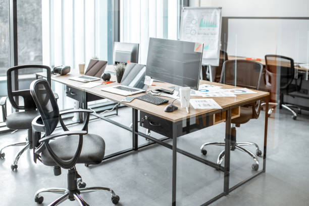 istock Coworking space with working places 1187868399