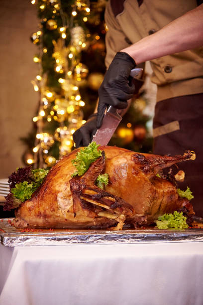 istock Appetizing baked turkey on a tray in a restaurant. 1187868529
