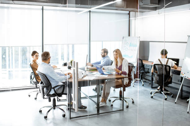 istock Office work with diverse coworkers 1187869316