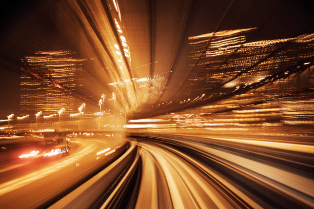 istock High Speed Motion Blur driving through a tunnel at night 1187869344