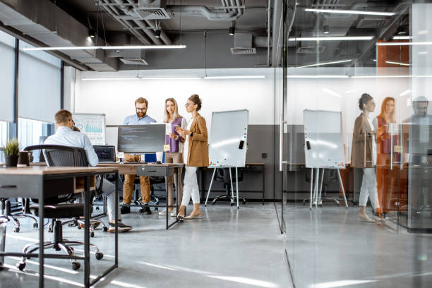 istock People working in the modern office 1187869447
