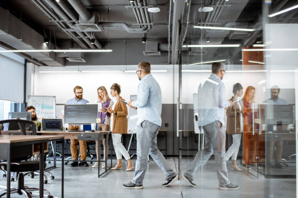 istock People working in the modern office 1187869451