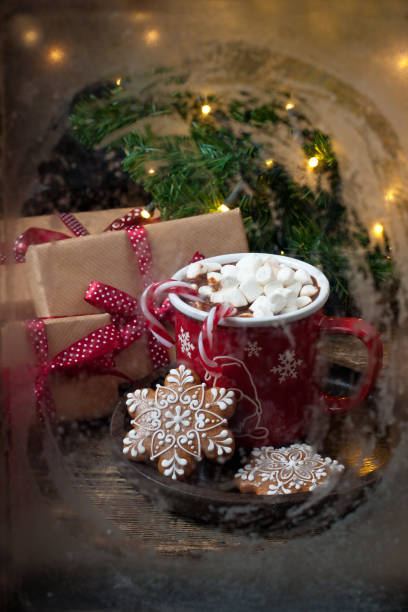 istock Christmas  treats   at winter window,  selective focus 1187870553