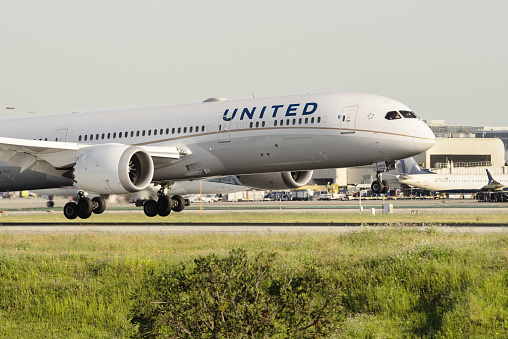 LOS ANGELES, CA/USA: Image of a United Airlines Dreamlinerm (Boeing 787) shown landing at the Los Angeles International Airport.