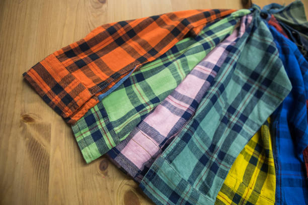 istock Group of Colored Cotton Shirts. Assorted shirt fabric samples. 1187879617