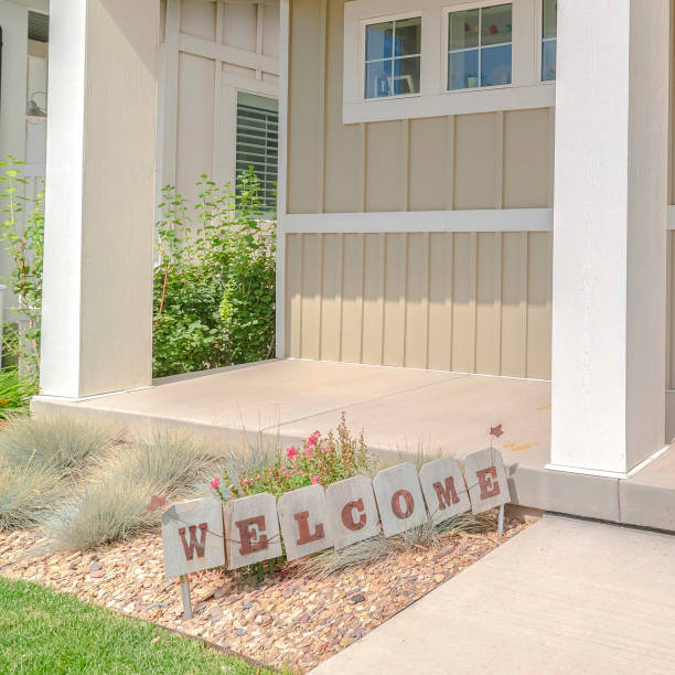 istock Square frame Front veranda of modern home with welcome sign 1187879682