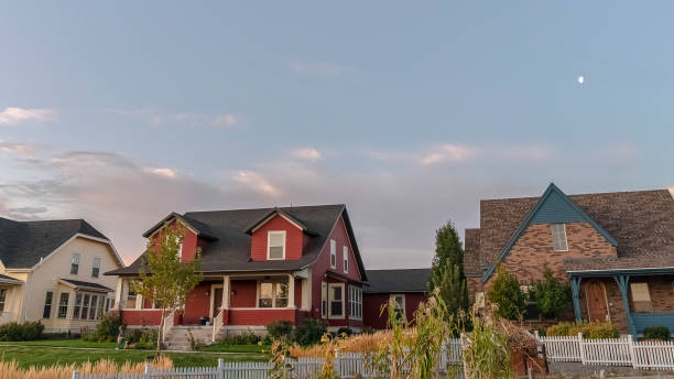 istock Panorama frame Three houses on a modern housing estate 1187879772