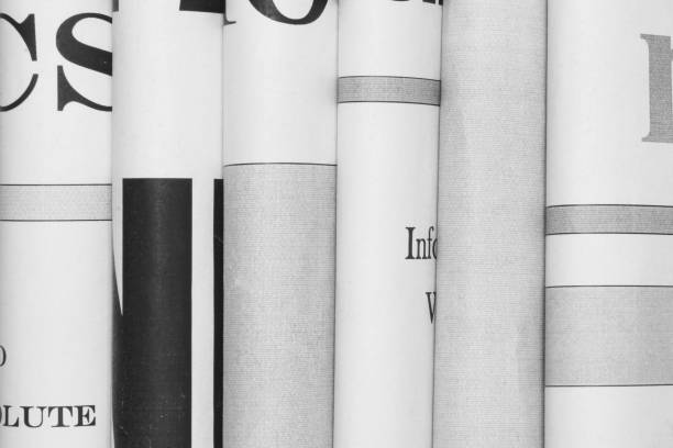 istock Newspapers with Headlines and Articles for Background 1187880735
