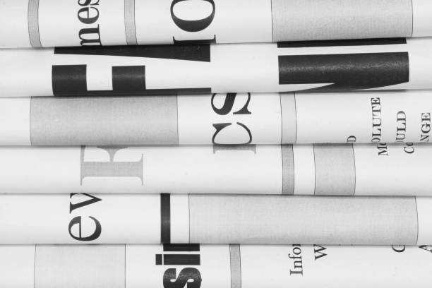 istock Newspapers with Headlines and Articles for Background 1187880744