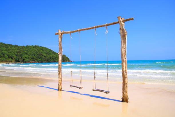 istock Clean Beach with Swing in Vietnam 1187883559