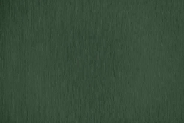 istock dark green paper textured background 1187890668
